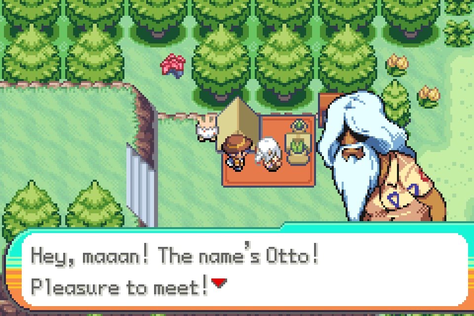 Otto introduces himself beside a table in a tree-lined clearing.