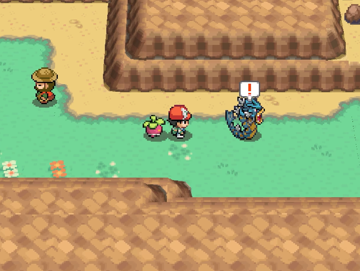 The player faces a person beside Gyarados below a rocky ledge, with an exclamation mark overhead.