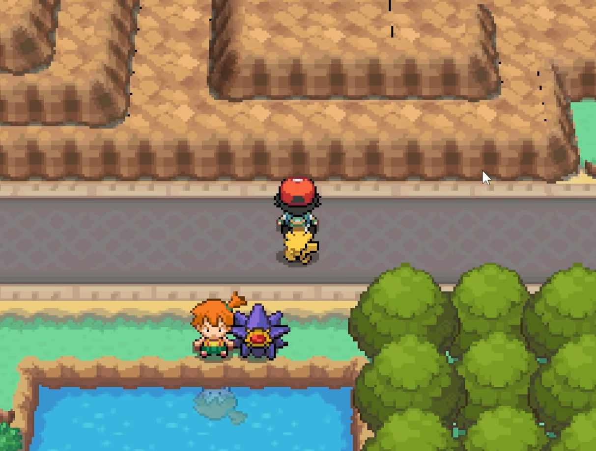 The trainer and Pikachu stand beside a pond near a person and Starmie.